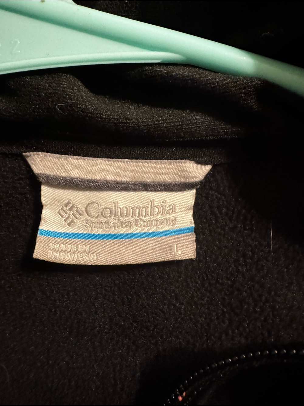Label inside black Columbia fleece